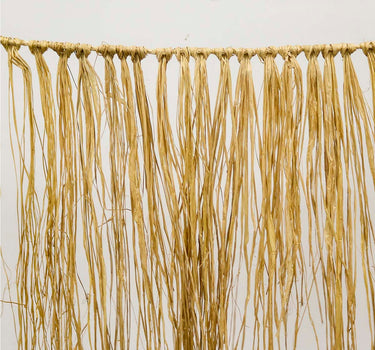 Guirnalda decorativa de flecos de rafia natural